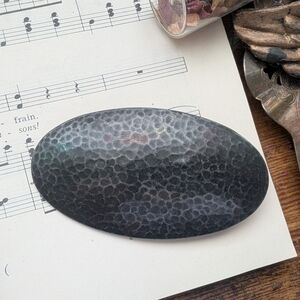 Textured Black Oval Metal Brooch By Oska